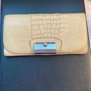 Authentic Coach wallet, cream, good used condition, lavender interior